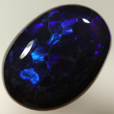 SOLID BLACK OPAL Royal blue fire. SEE VIDEO